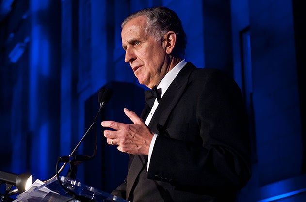 Paul Tagliabue speaking into microphone