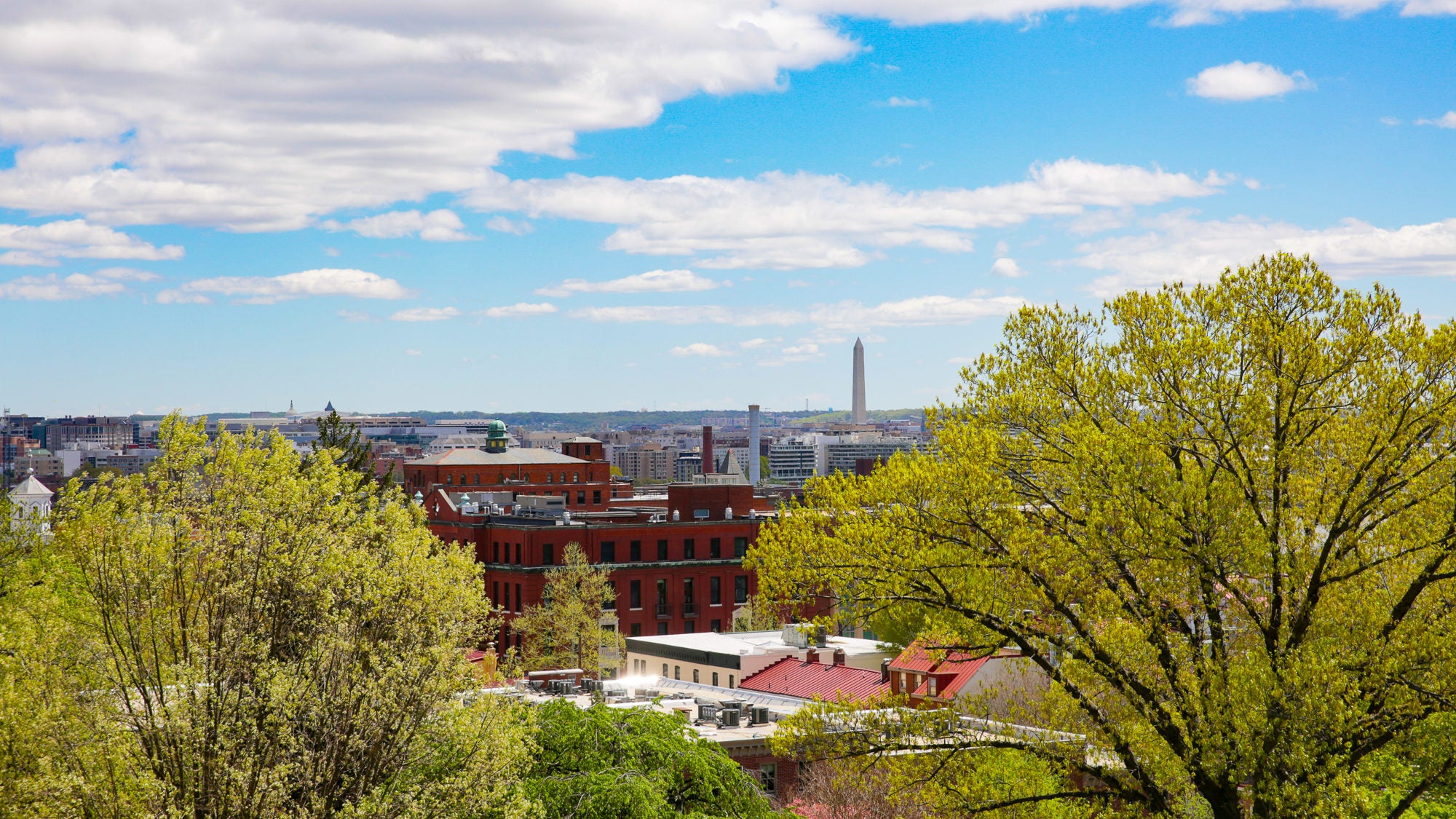 Photo displays an aerial view of the DC landscape from Georgetown.