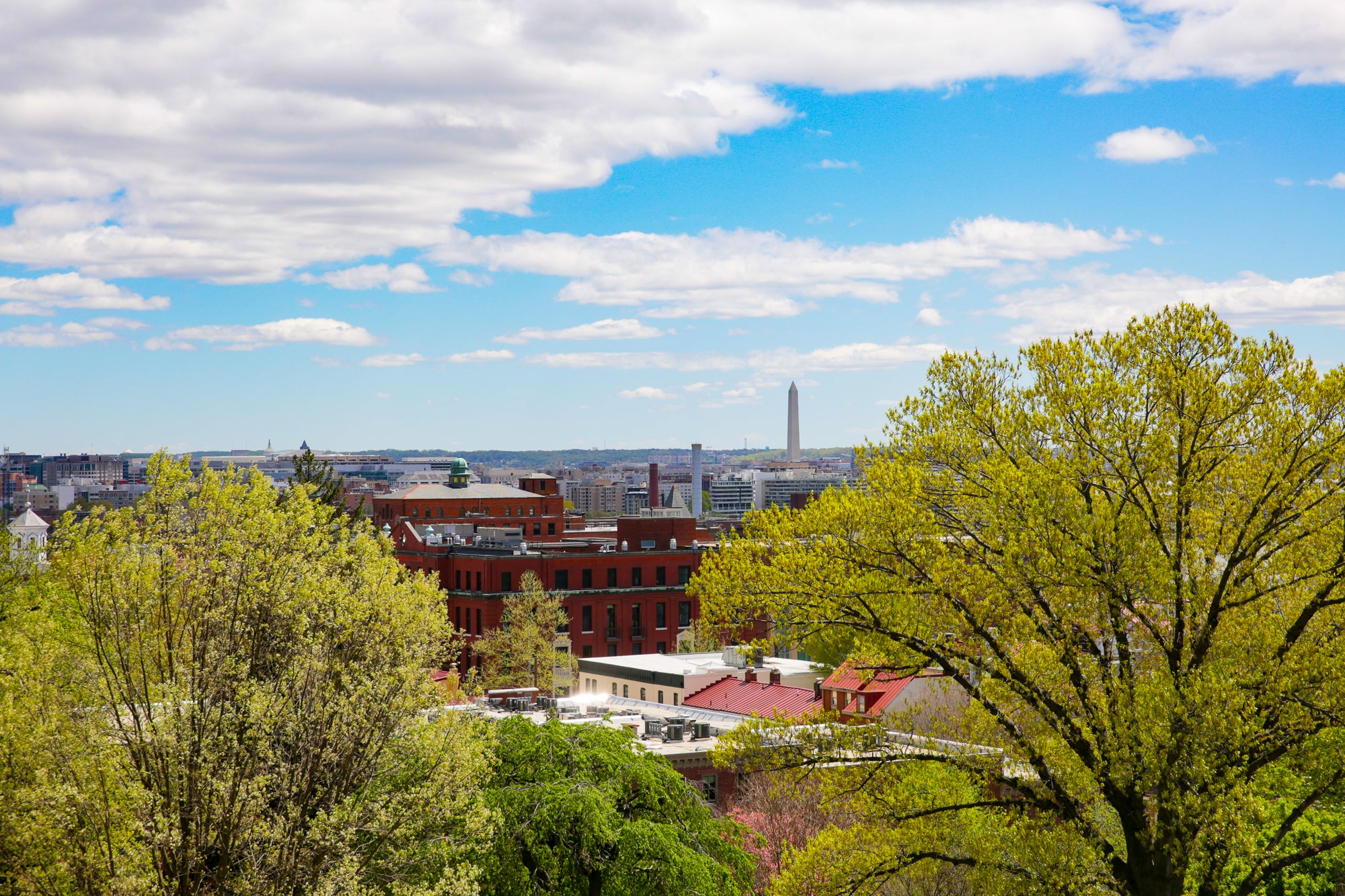 Photo displays an aerial view of the DC landscape from Georgetown.