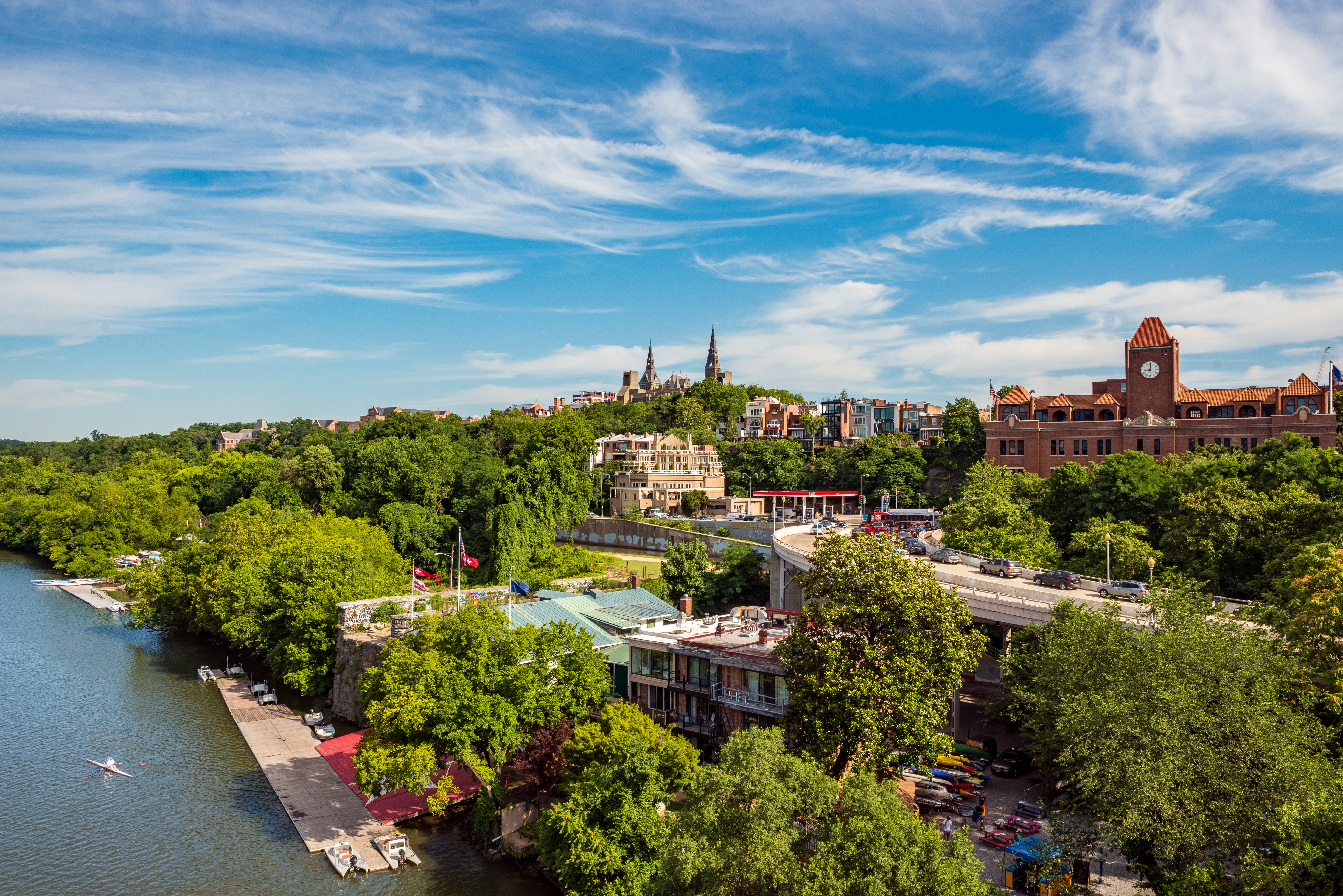 The Georgetown waterfront is framed by a large blue sky.