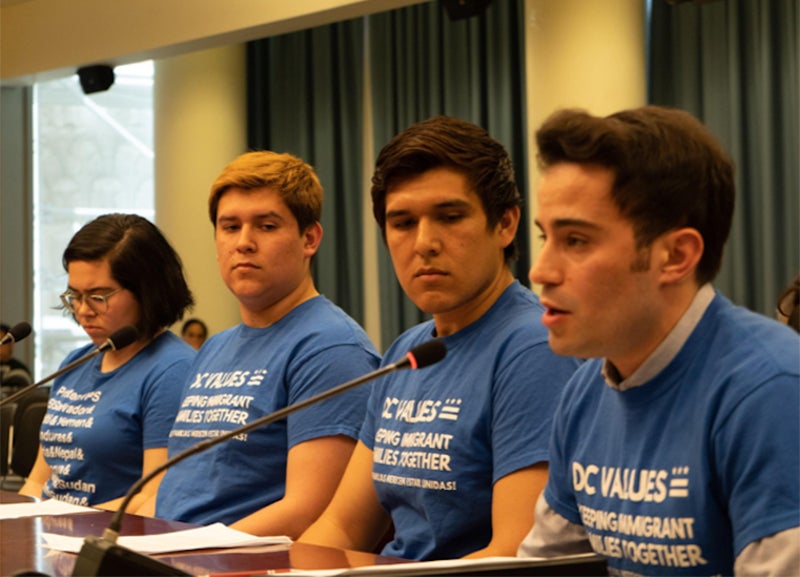 Law students wearing T-shirts that say "DC Values..."