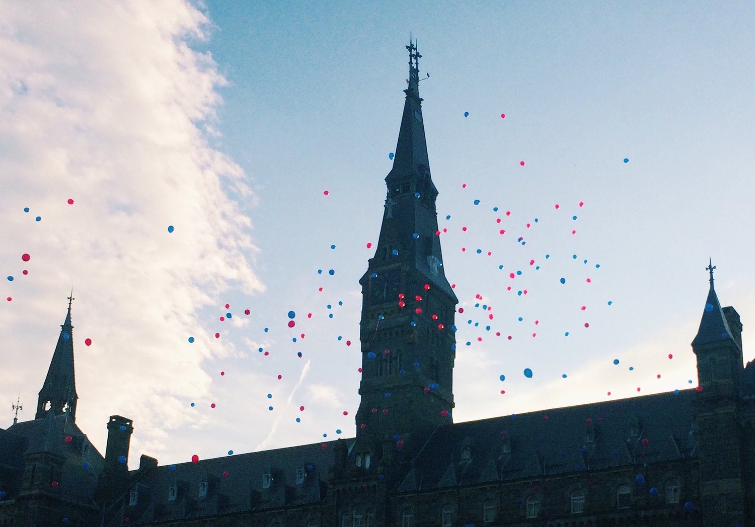 Balloons float over Healy Hall