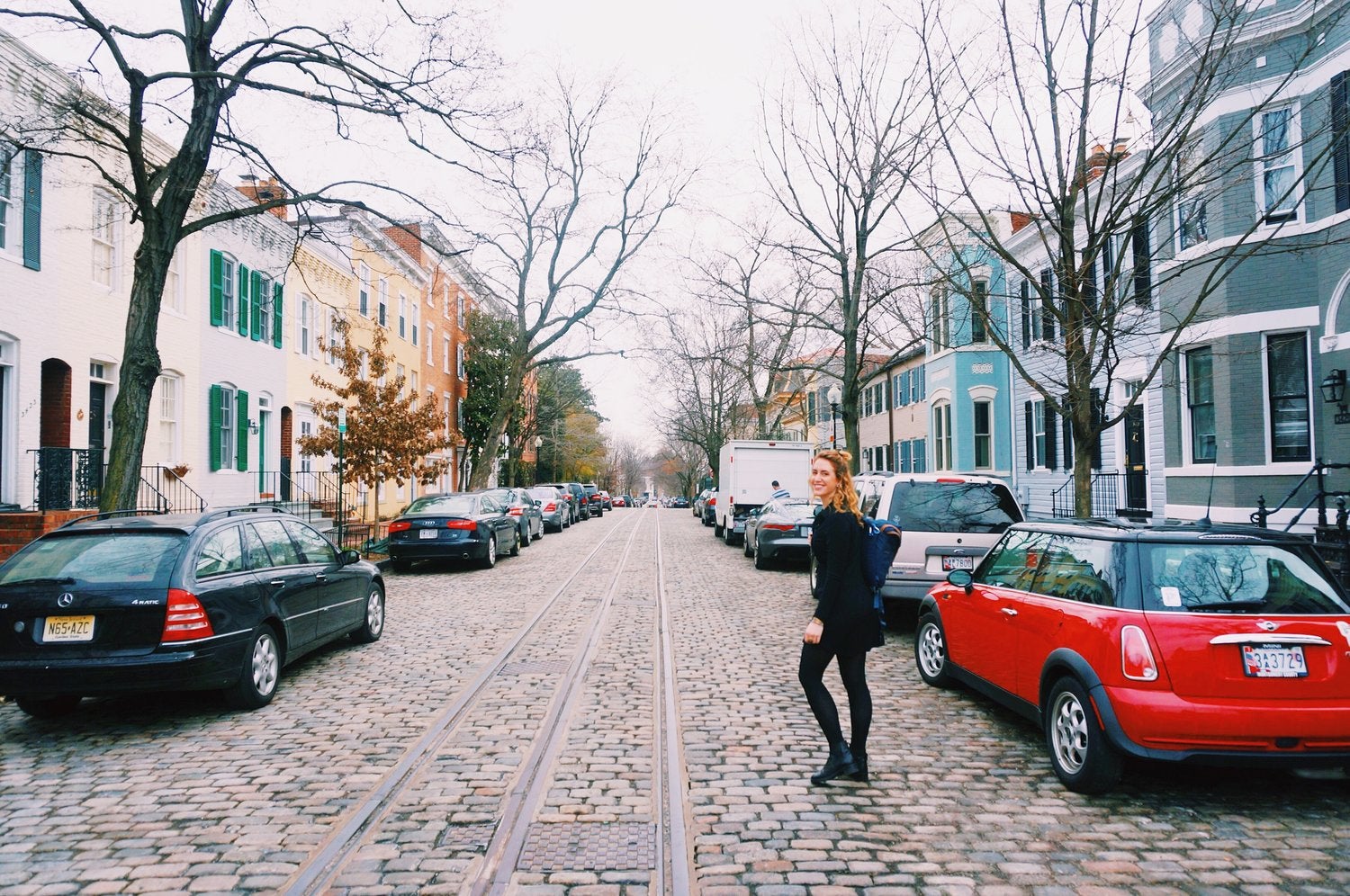 A student walks through the neighborhood