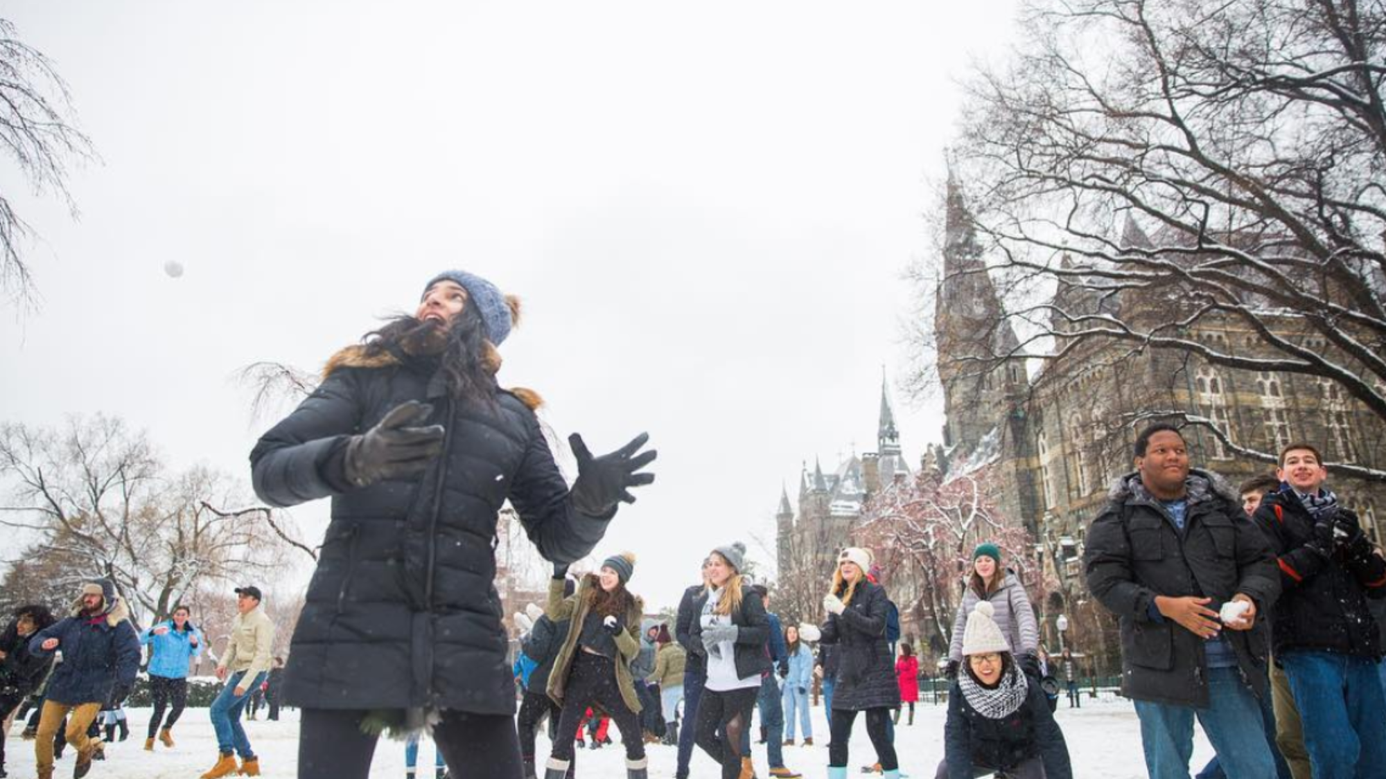 Students throw snowballs