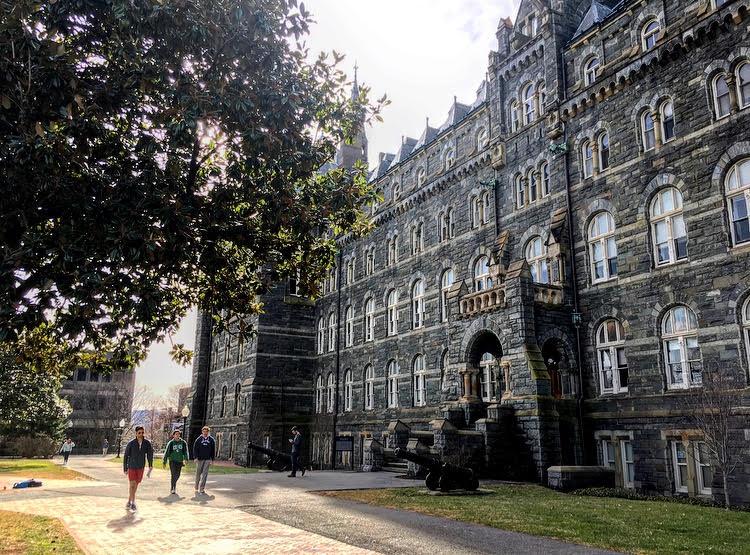 Healy Hall rises above the front lawn