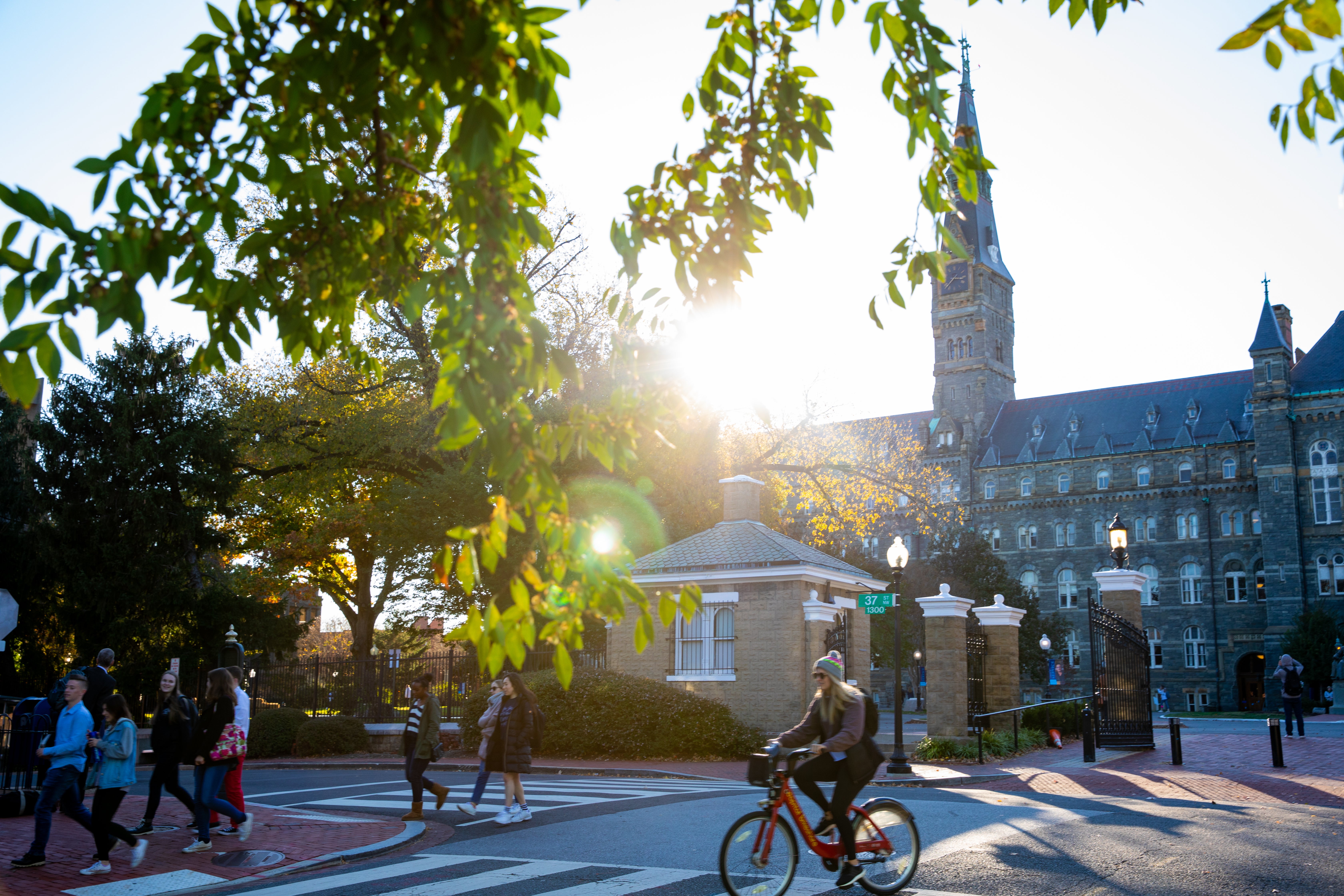 Students cross the street at the intersection of 37th and O street.