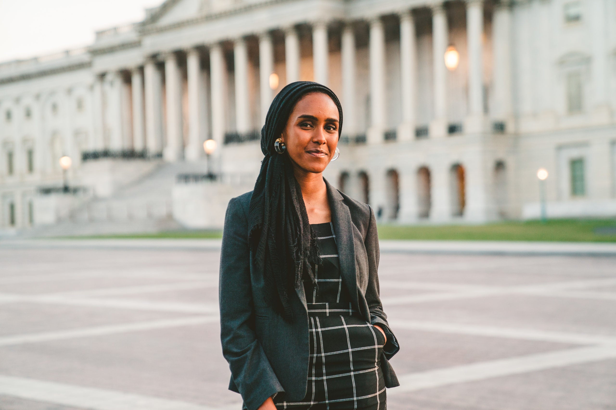 Kawther Berhanu standing in front of a building