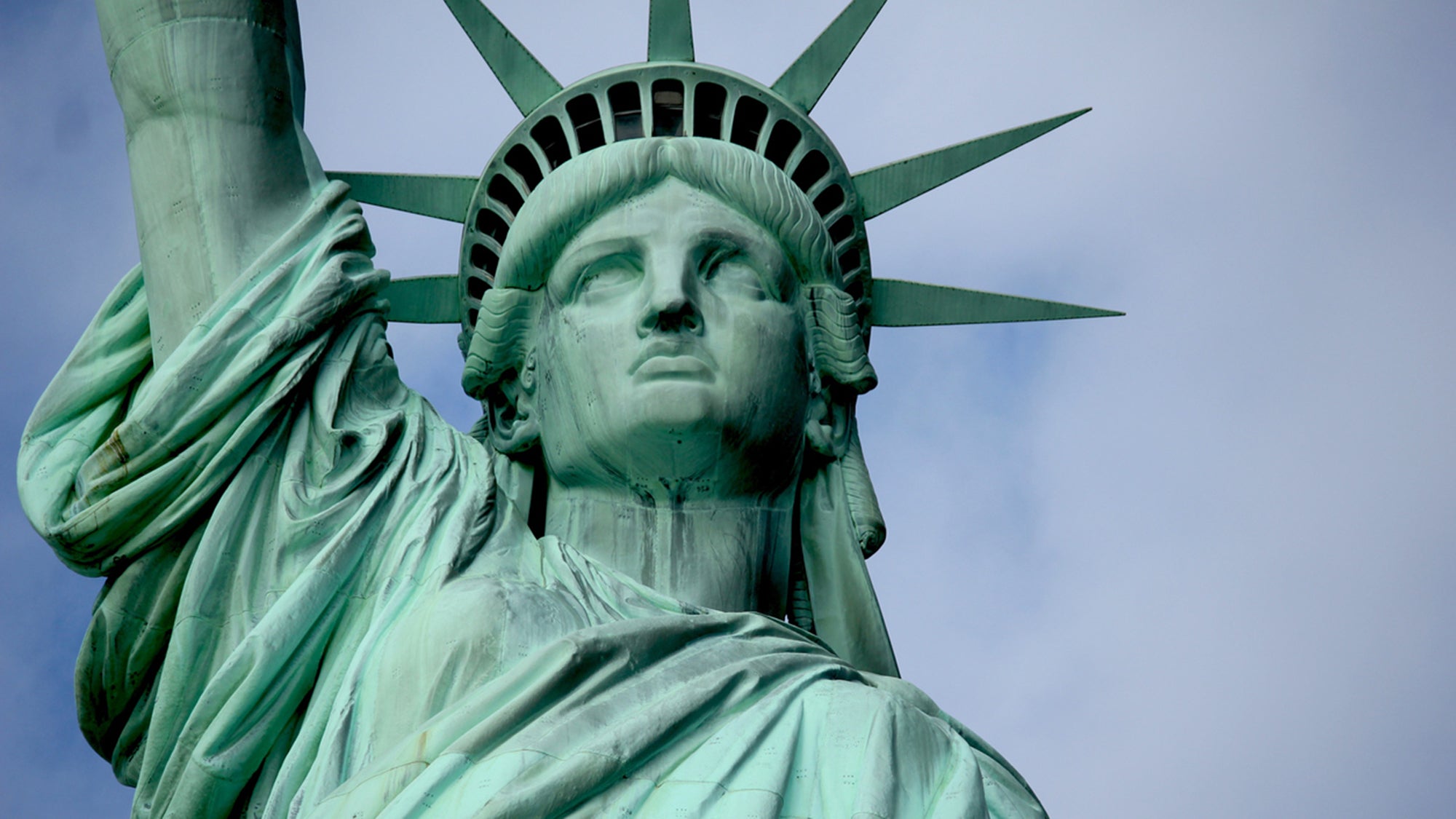 Closeup of top half of Statute of Liberty