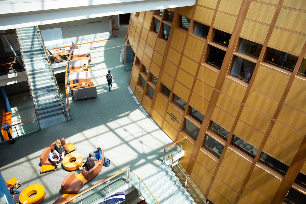 Image displays an aerial view of the inside of the McDonough School of Business