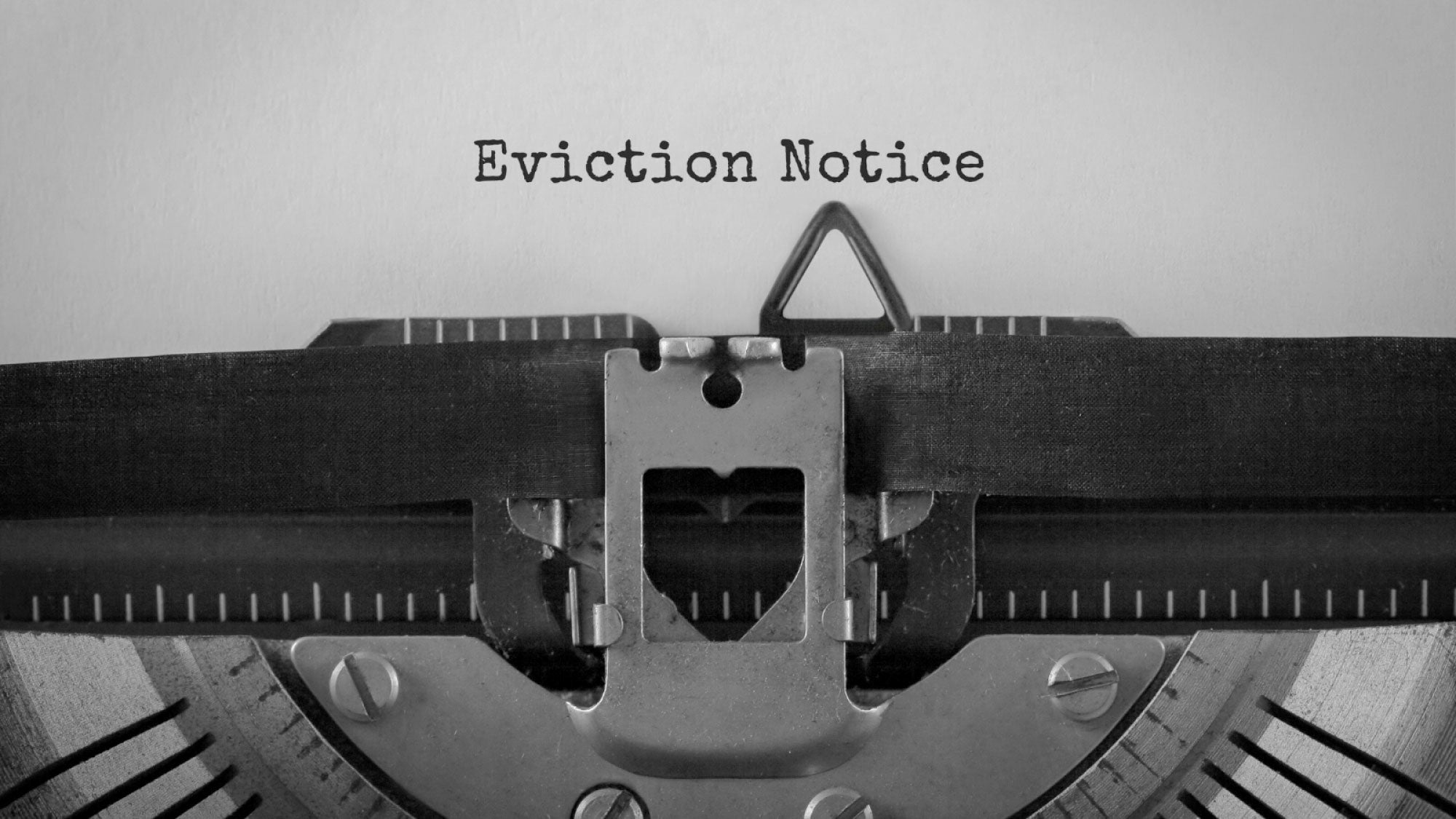 A typewriter types out "Eviction."