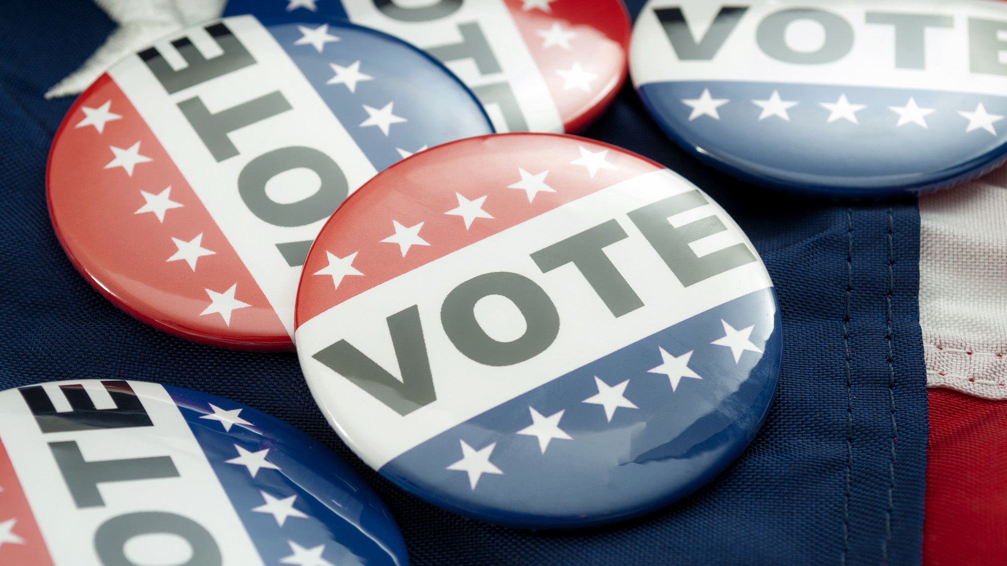 Buttons that say VOTE with white stars on red and blue