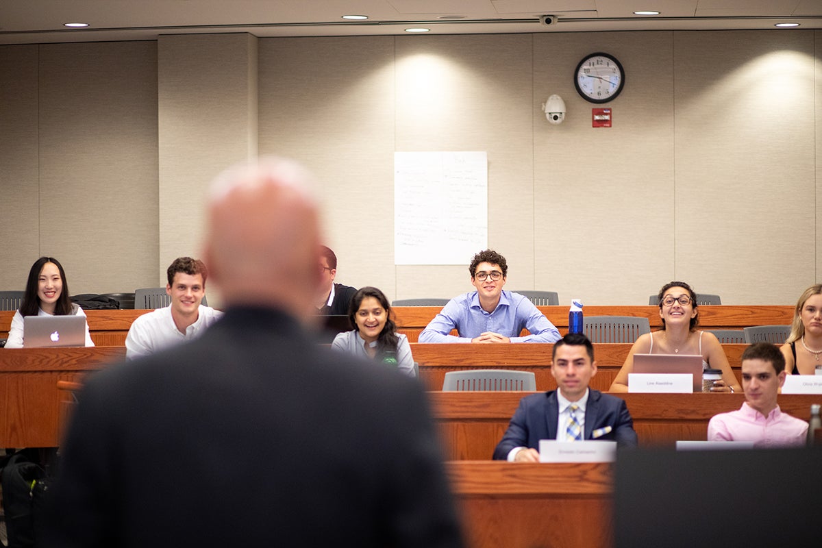 Man speaks to classroom of students