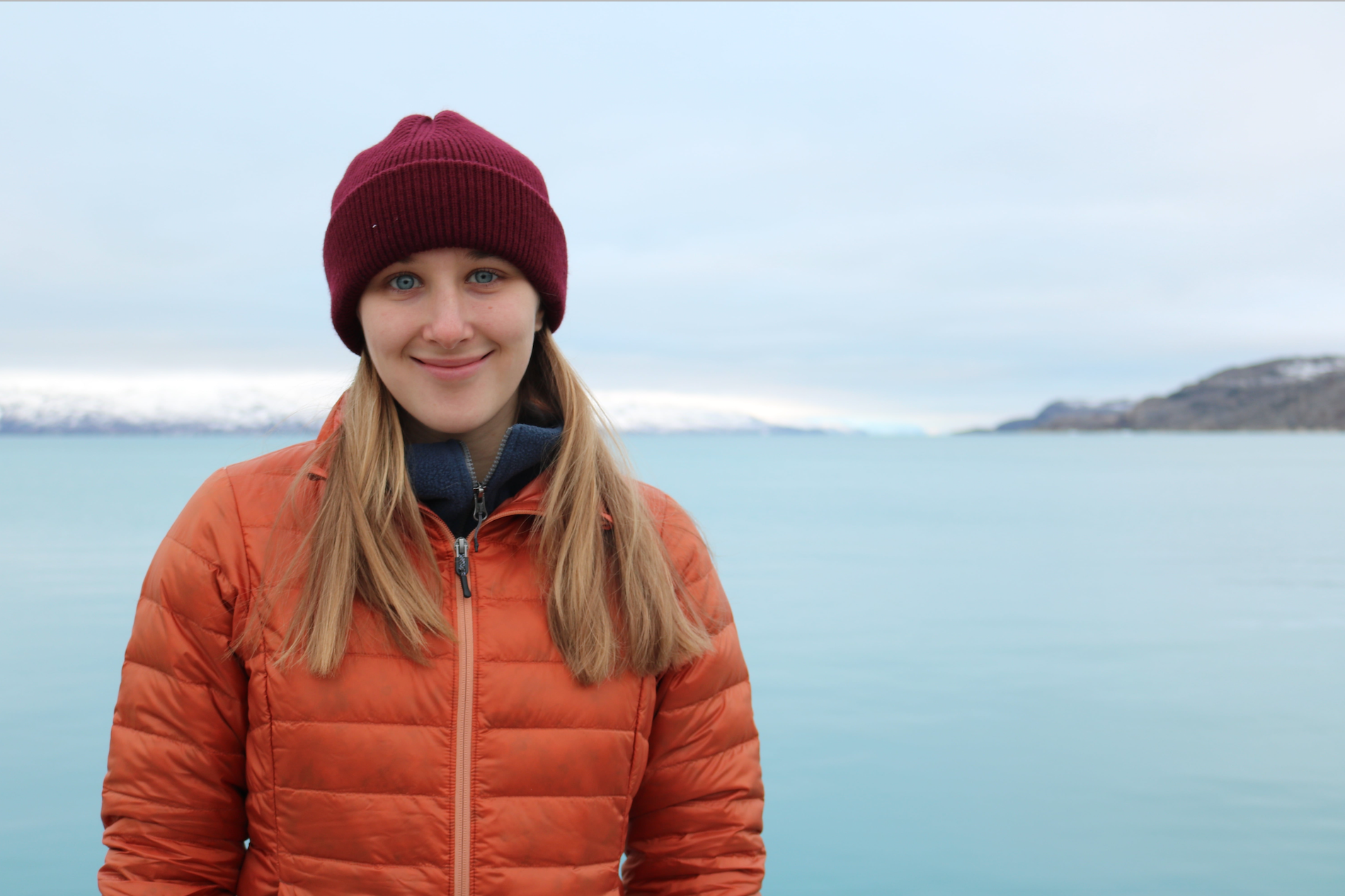 Laura Ratliff in front of a lake in Kangerlussuaq, Greenland