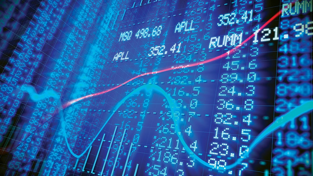 Graphs along a blue and black digital screen with tables of percentages