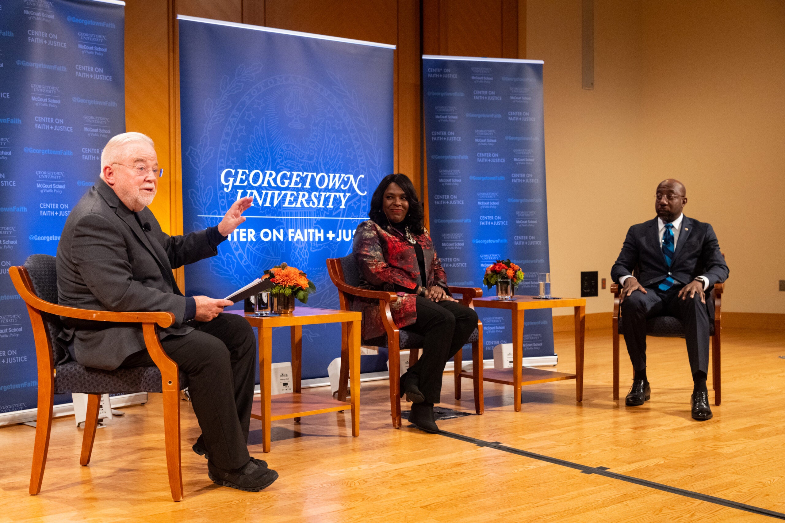 Congresswoman Terri Sewel and Senator Raphael Warnock at the Center on Faith and Justice event