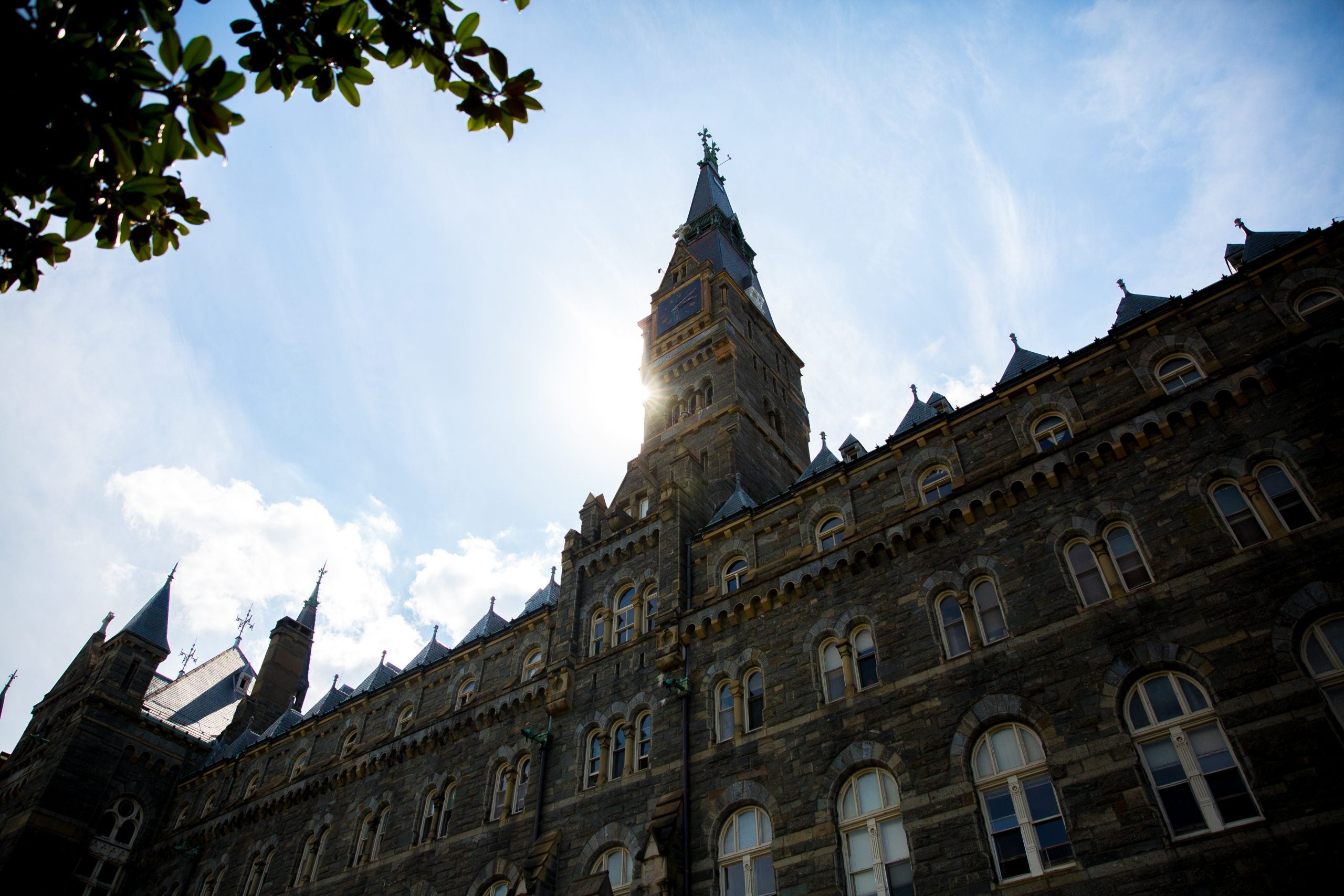 Sun behind Healy Hall