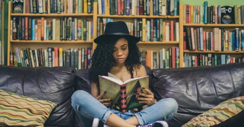 An image of a student reading a book.