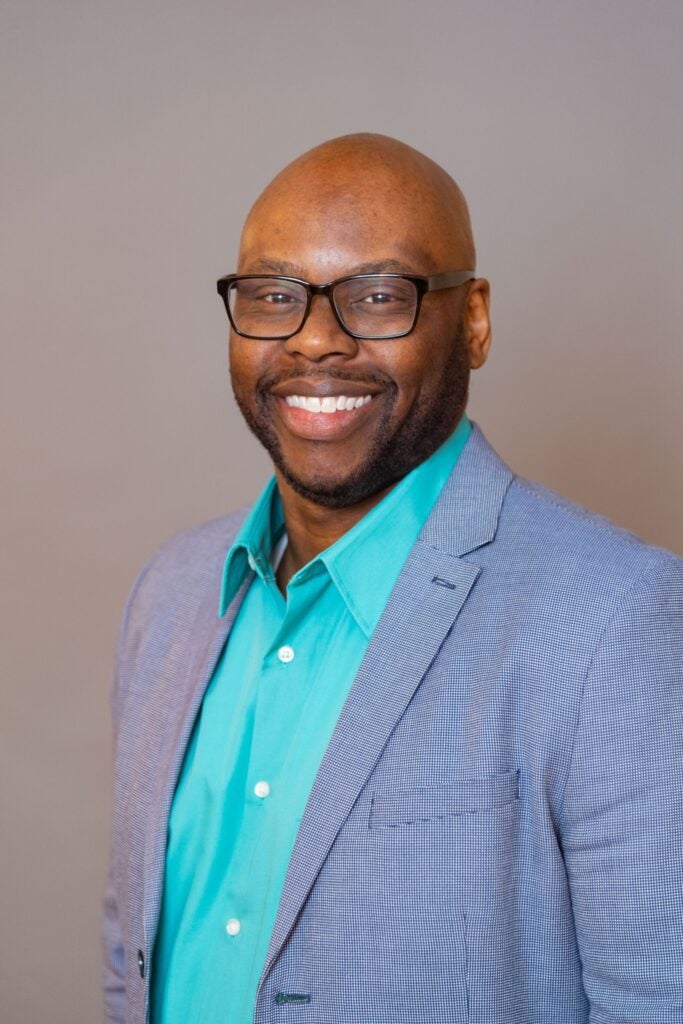 A headshot of Tony McCright, a graduate of Georgetown's Pivot Program