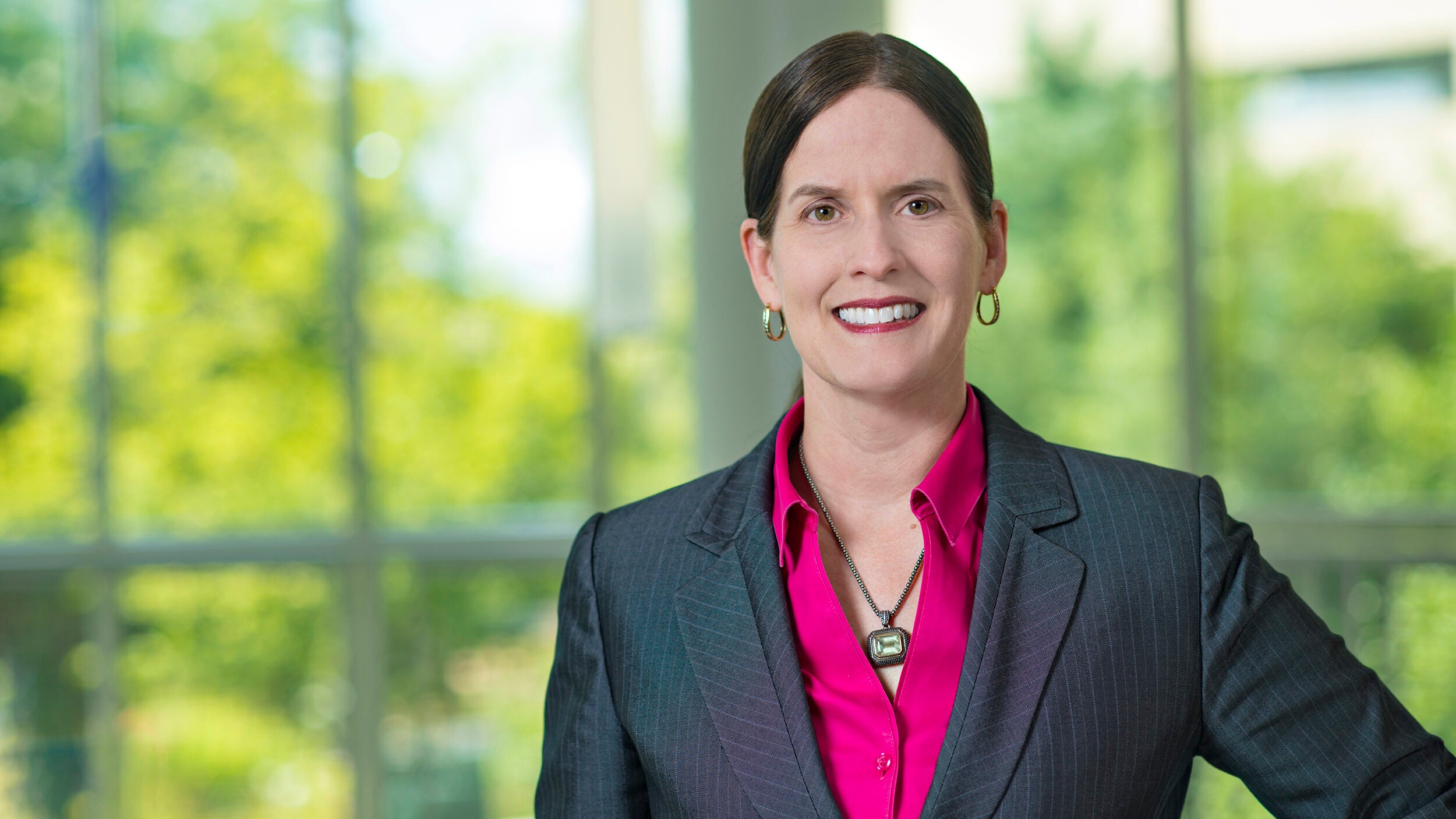 A headshot of Laura DeNardis, Ph.D., a globally-recognized technology and society scholar