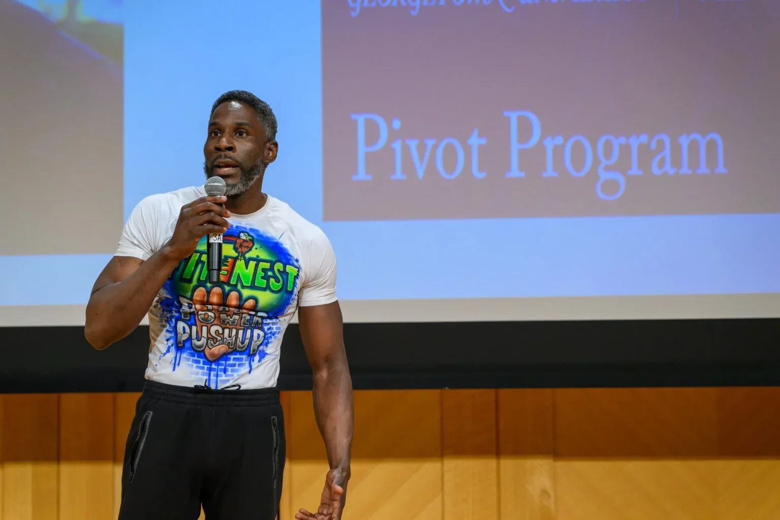 Pivot's Raashed Hall presents at the MSB Rocket Pitch competition on Feb. 2 in front of a screen that reads "Pivot Program."