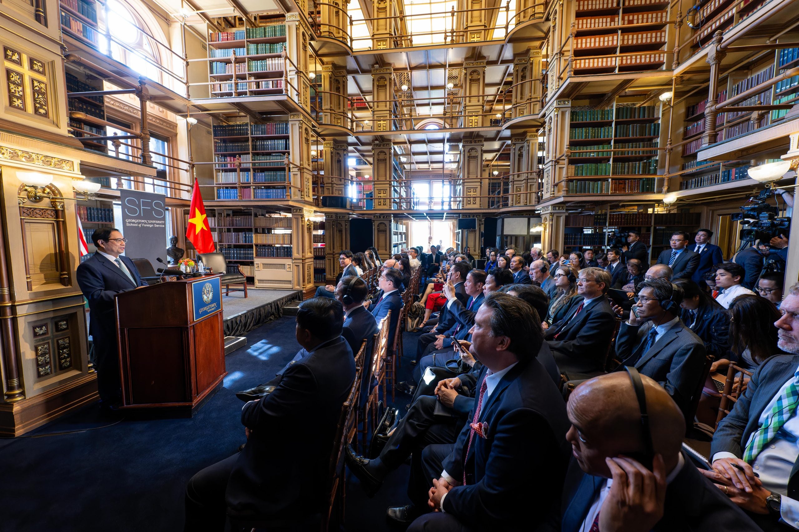 The prime minister of Vietnam addresses the Georgetown community inside the university's Riggs Library.