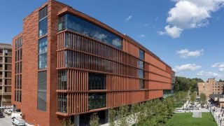 A sleek, modern brown building on Georgetown&#039;s campus.