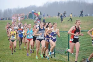 Kirsten Kasper running in a race on a cloudy day