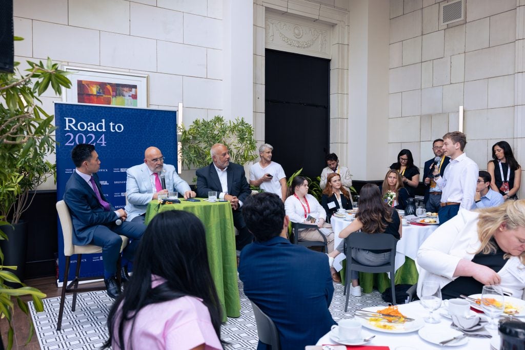 Students at a panel with Mo Elleithee, Chris LaCivita and Lanhee Chen