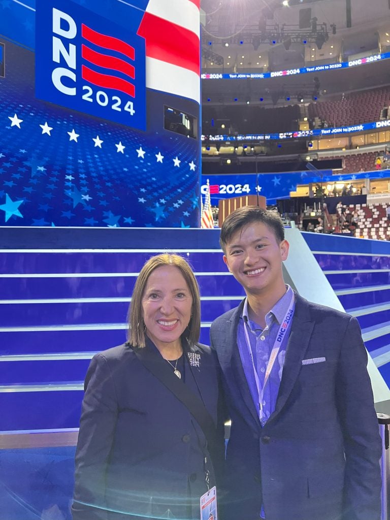 Bennie and a woman at the DNC by the main stage