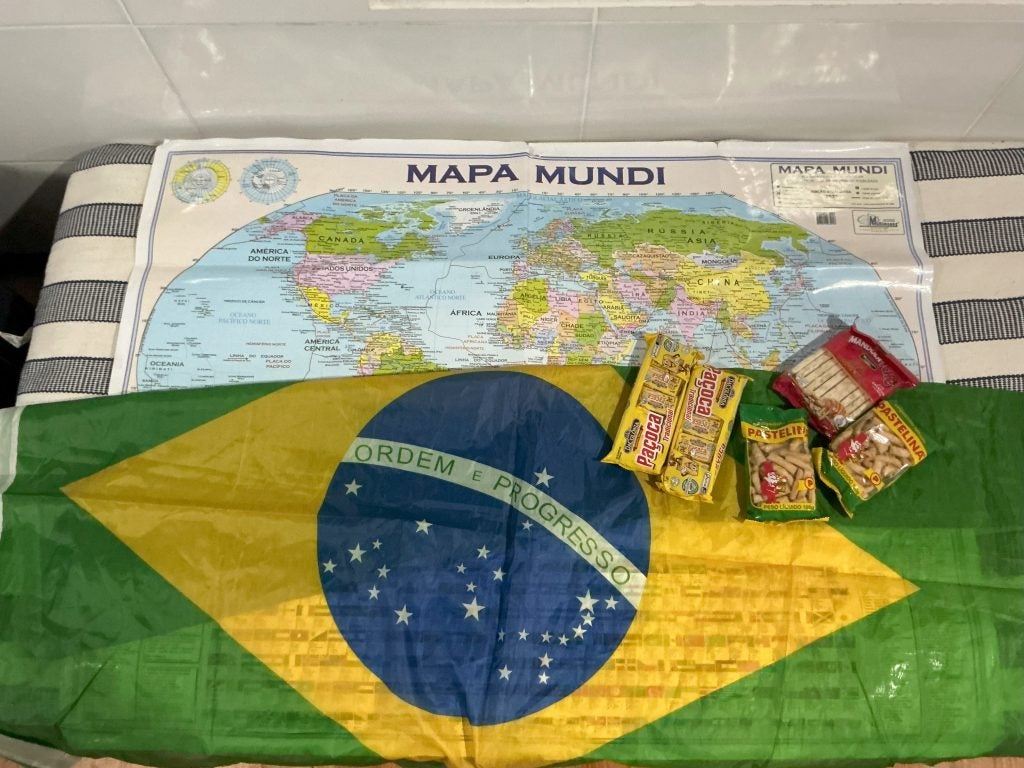 A Brazilian flag, world map, and snacks.