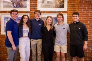 Luke with Spring 2024 GU Politics Fellow Machalagh Carr and the rest of his Student Strategy Team.