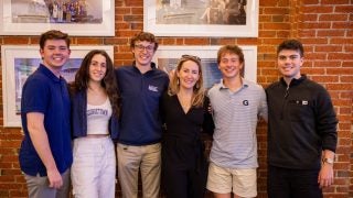 Luke with Spring 2024 GU Politics Fellow Machalagh Carr and the rest of his Student Strategy Team.