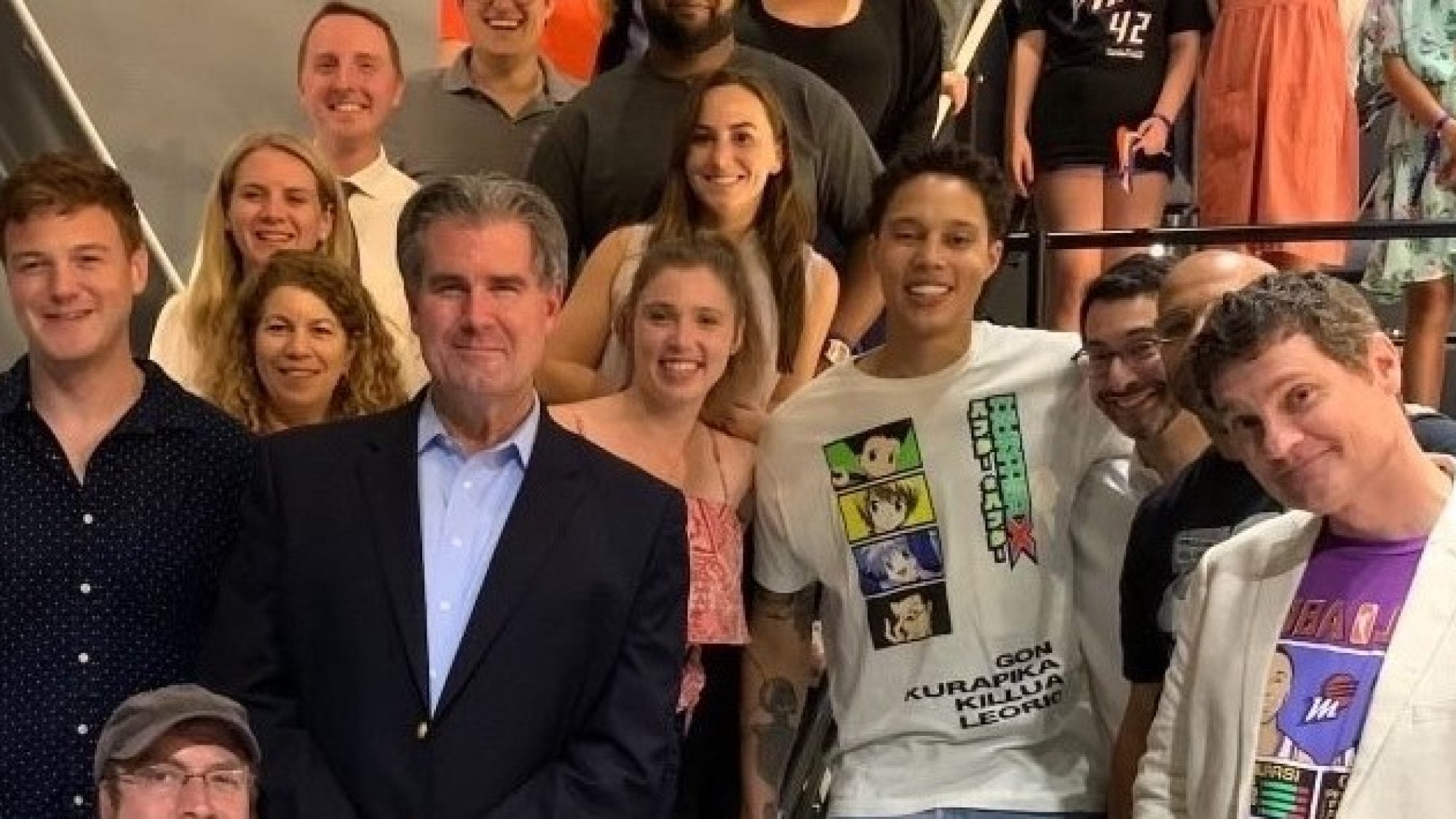 Gillen with Griner and others on his team at a WNBA game