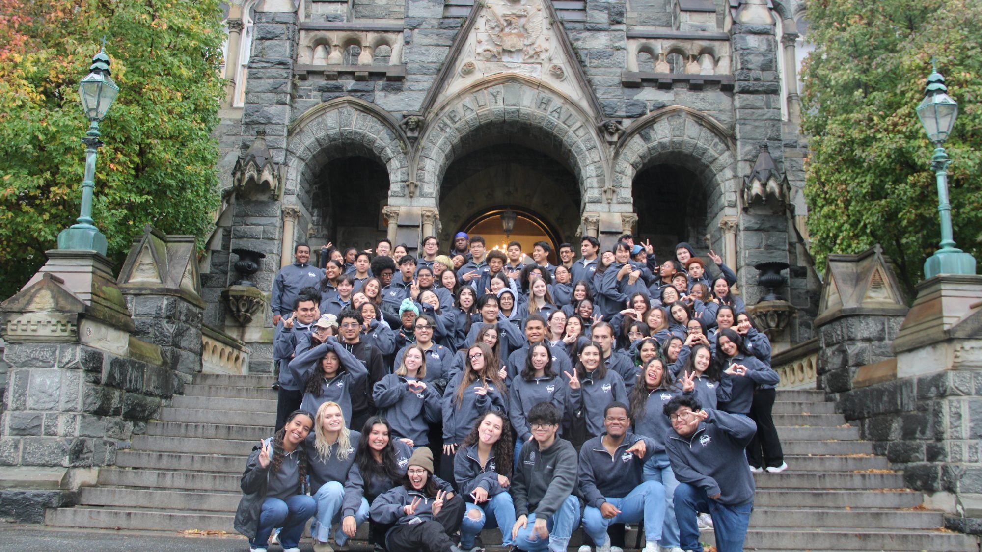 GSP students in matching shirts on Healy Steps