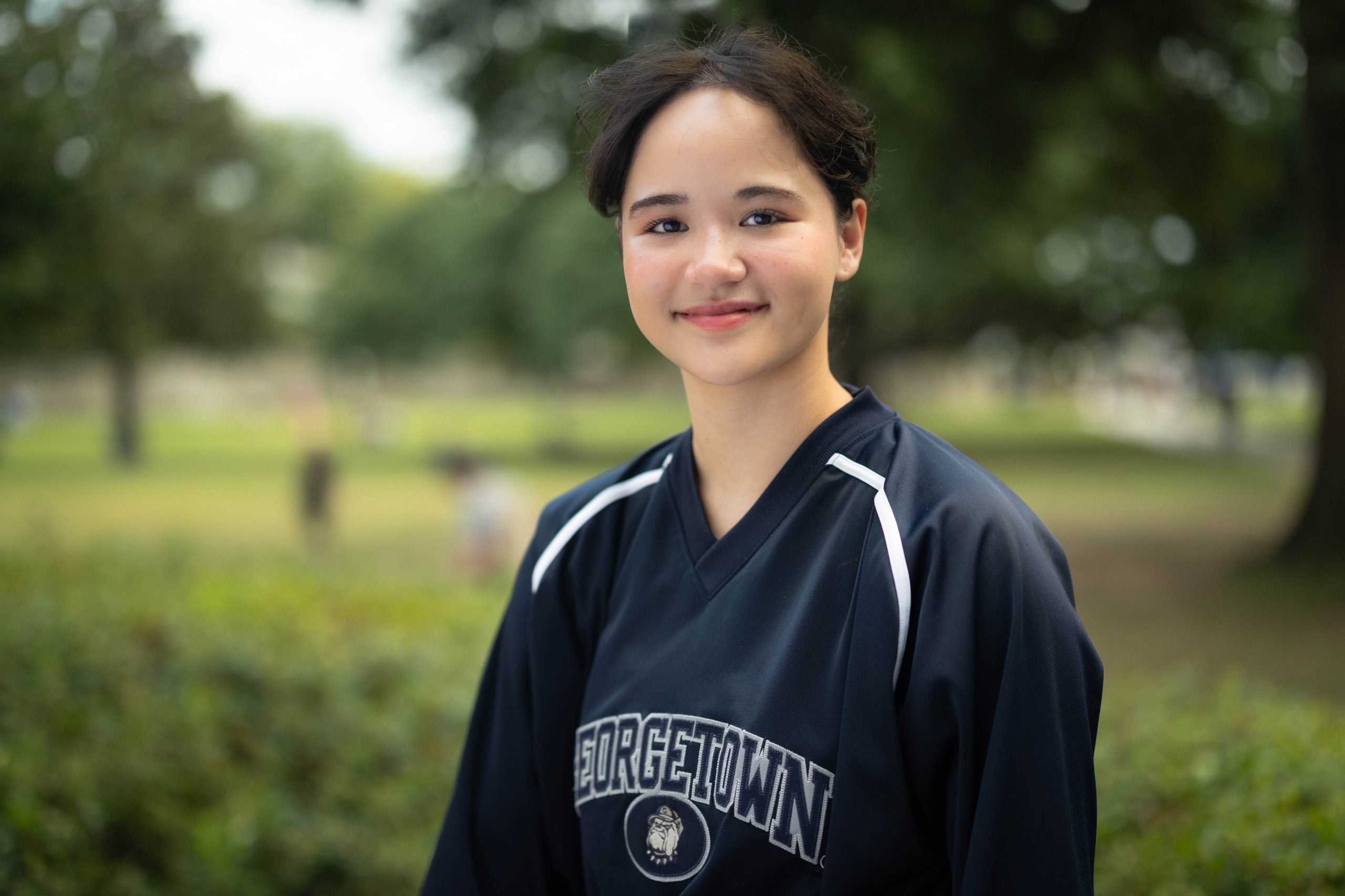 Juliette Robinson in a dark blue GU shirt