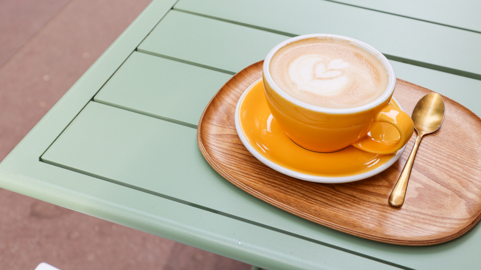 Latte on a table outdoors