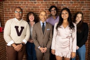 A group of students meet with a fellow in GU Politics.