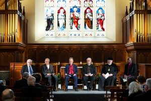 6 panelists in Dahlgren Chapel