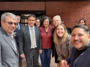 A group of people pose together at Georgetown.