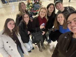 A group of students pose for a selfie