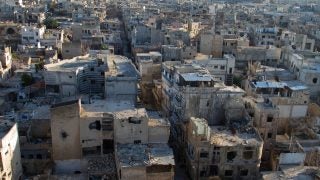 Homs, Syria in ruins with a lot of rubble on a sunny day