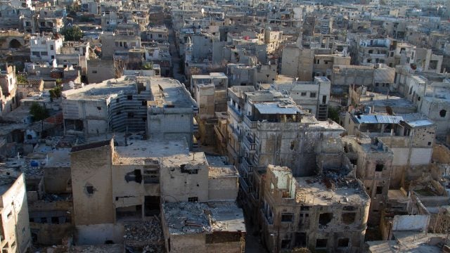 Homs, Syria in ruins with a lot of rubble on a sunny day