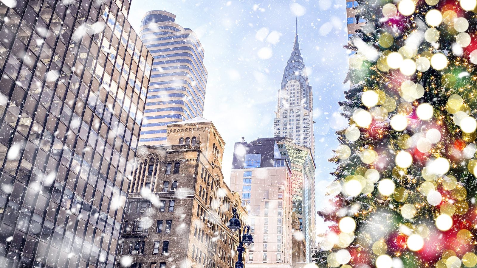 Christmas tree with a snowy New York City in the background