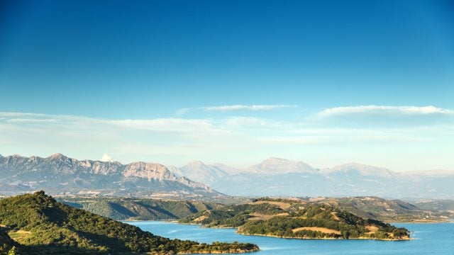 A vista of mountains and ocean in Greece