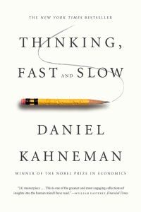 A white book cover that says, "Thinking, Fast and Slow" with a mini pencil below it.