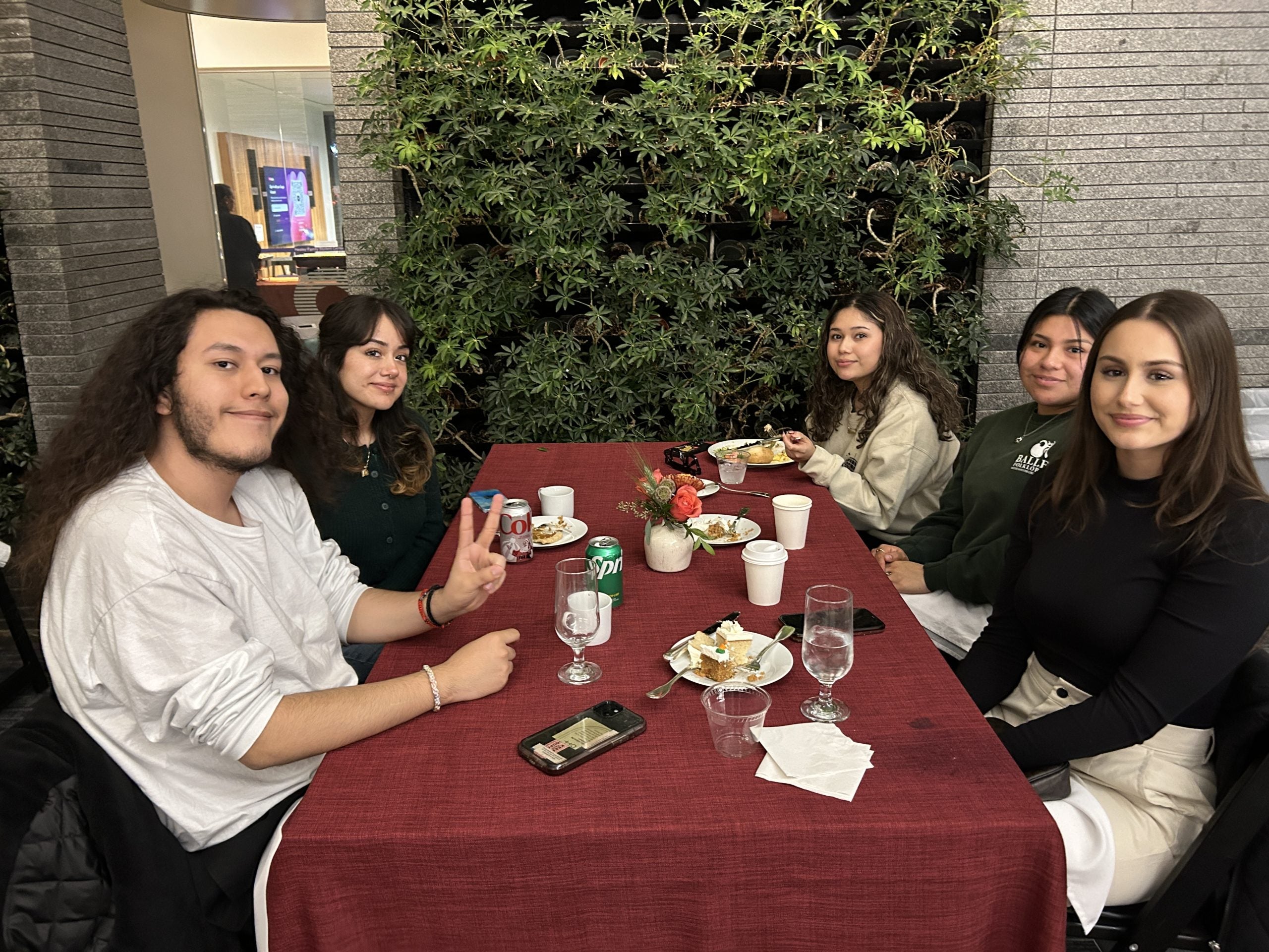 5 students at a table for Thanksgiving