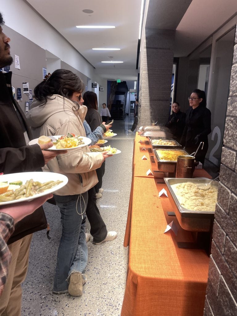 Students line up for food for Thanksgiving