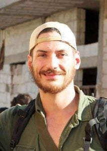 Austin Tice in a baseball cap and shirt in Syria