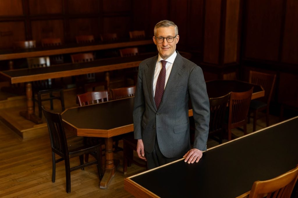 David Edelstein in a gray suit and dark red tie