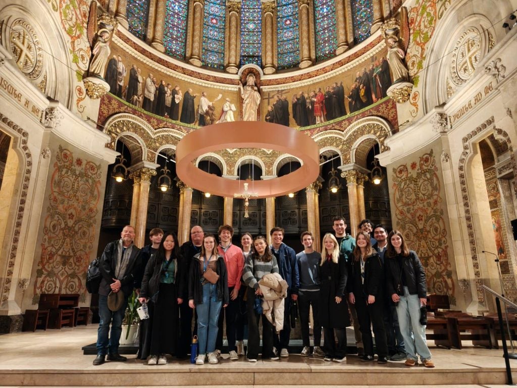 Group of students on the altar in a church